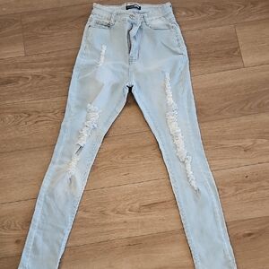 Fashion Nova Light Blue Ripped Skinny Jeans